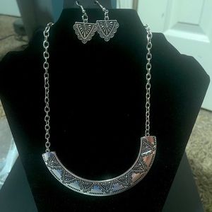 Necklace and earring set one size fits all.